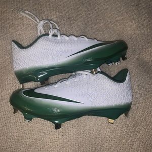 Green and white Nike Baseball Cleats size 8